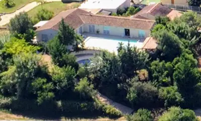 an aerial view of a house with a swimming pool at Casalta di san ghjuva in Eccica-Suarella