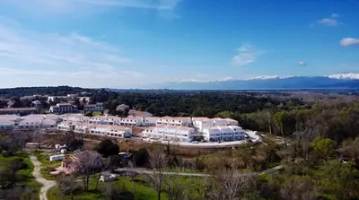 an aerial view of a resort with mountains in the background at T2 VUE MER MARINA DI BRAVONE N197 in Linguizzetta