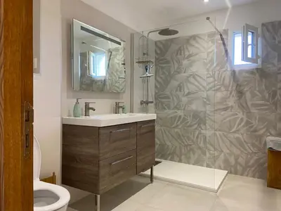 a bathroom with a sink and a shower at Casa Laura in Cervione