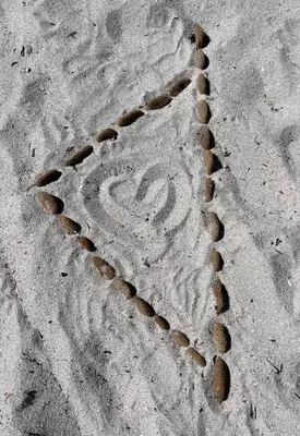 a pattern of rocks in the sand at Villa A CASA DI LO in Lecci