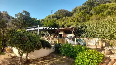 a house with a building with a bunch of trees at Villa T4 à Campomoro corse du sud, 800m plage in Belvédère