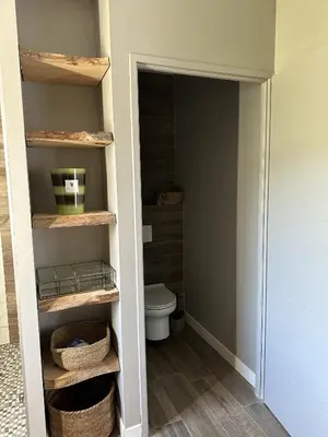 a bathroom with a toilet in a room at Villa Casa di Simone Pietrosella Corse du Sud in Pietrosella