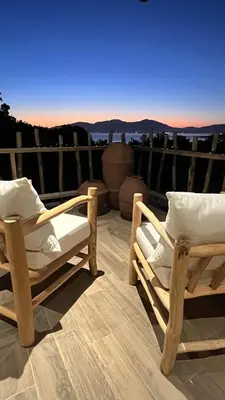 a pair of chairs sitting on top of a roof at Villa Casa di Simone Pietrosella Corse du Sud in Pietrosella