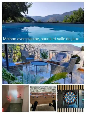 a patio with chairs and a table on a balcony at Maison Corse avec piscine et sauna - La Casa Lilia in Campile