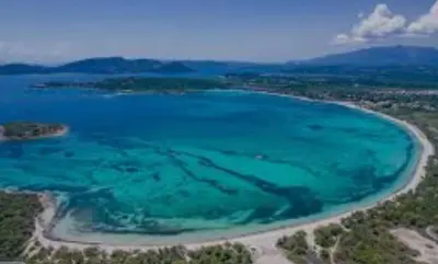 an aerial view of a beach with blue water at Porto vecchio Résidence Don Andria T2 in Lecci