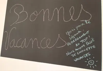 a chalkboard with the wordamed insurance written on it at Entre mer et montagne in Monte
