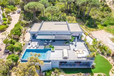 an aerial view of a house with a swimming pool at Villa A Pinetta Villata in Sainte-Lucie de Porto-Vecchio