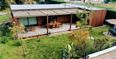 an overhead view of a house with a table at Maison de vacances avec piscine proche mer et montagne in Ghisonaccia