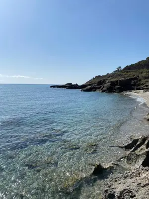 a view of the ocean from a rocky beach at T2 VUE MER CORSE N193 in Linguizzetta
