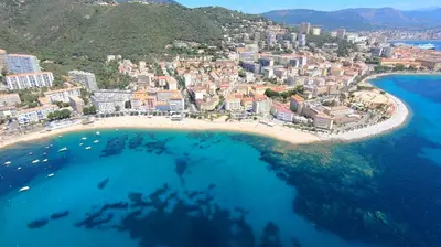 an aerial view of a city and the ocean at Bel appartement 2 chambres à Proximité des Commodités in Sarrola-Carcopino
