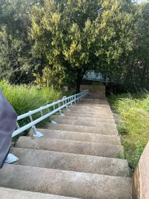 a set of stairs with a tree on top at U Paradisu in Piana