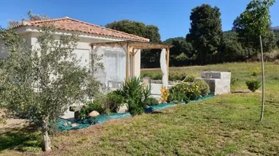 a house with a gazebo in a yard at Villa Piazzola in Petreto-Bicchisano