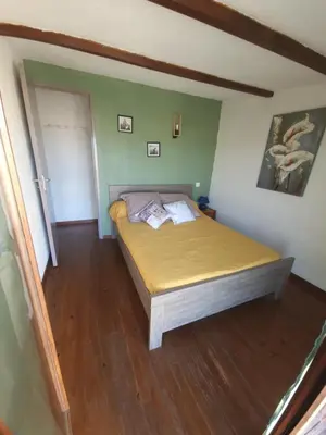 a bedroom with a bed in a room at Villa Frati in Poggio-Mezzana
