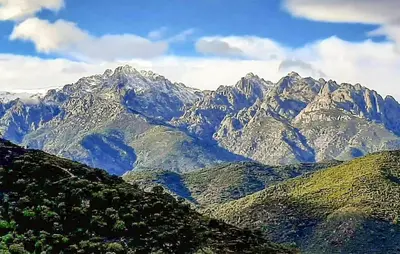 a view of a mountain range with clouds in the sky at 2 Bedroom Stunning Home In Popolasca in Popolasca