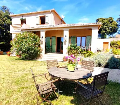 a table and chairs in front of a house at Mare e Monti Chez Thomas et Magali in Vico