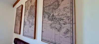 a map of the world hanging on a wall at Bergerie A Sapara in Pianottoli-Caldarello