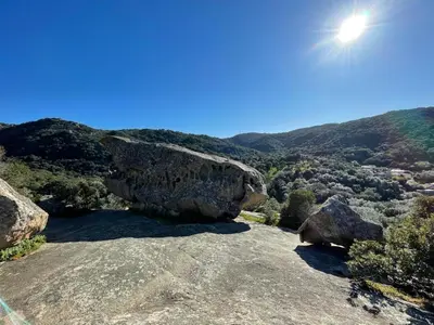 a view from the top of a mountain with rocks at Chalet maisonette dans hameau calme in Bonifacio