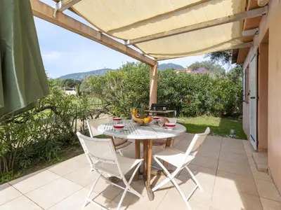 a table and chairs on the patio of a house at Holiday Home A Vigna by Interhome in Sotta