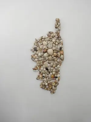 a group of pebbles arranged in the shape of a peace symbol at Appartement T2 Porto in Porto Ota