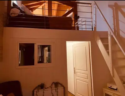 a room with a staircase with a door and a stair case at Villa Pierre SANTONI in Porticcio