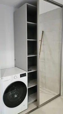 a washing machine in a room with a shower at Nouveau Superbe appartement - Rsd Calypso Tiuccia in Casaglione