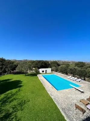 an image of a swimming pool in a yard at Château Balesi Bonifacio in Bonifacio