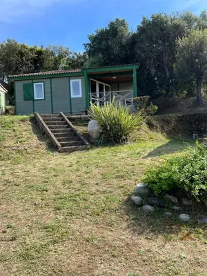 a small green house with stairs leading to it at Lavallee4 in Belvédère