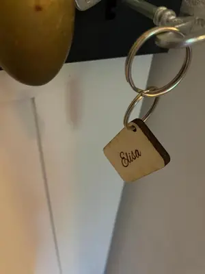 a key chain with a tag attached to it at Domaine du Couvent de Saint Julien in Bonifacio