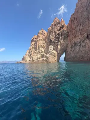 a large rock formation in the middle of the water at T3 - 100m du port in Propriano