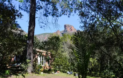 a mountain in the distance with a house and trees at Stunning Home In Afa With Wifi in Afa