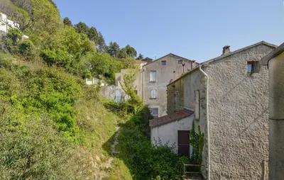 a village on the side of a hill at Lovely Apartment In Poggio Di Nazza in Poggio-di-Nazza