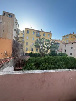 a view of a city with buildings in the background at Appartement Ajaccio hyper centre in Ajaccio