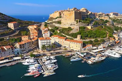 an aerial view of a harbor with boats in the water at La Casa Soliam in Bonifacio