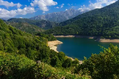 a view of a lake in the mountains at Maison de Vacances Avec Piscine Privée en Corse, BORGO in Borgo