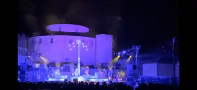 a crowd of people at a concert at night at Casa Mulinchese entre Mer et Montagne in Volpajola