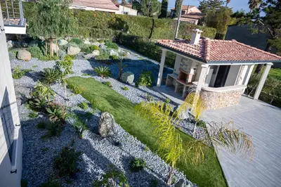 an overhead view of a garden with a patio at Rez de maison neuve Piscine WiFi Poolhouse en Pierre in Penta-di-Casinca