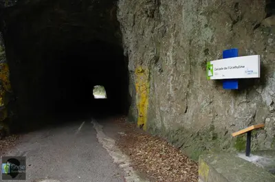 a dark tunnel with a sign on the side of it at Soleil & mer sur la Costa Verde in Cervione
