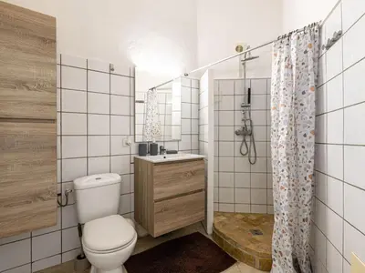 a bathroom with a toilet and a shower at Studio Germaine by Interhome in Porto-Vecchio