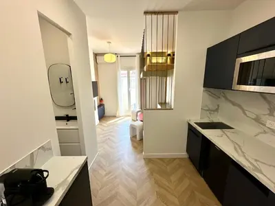 a kitchen with a sink and a counter top at Superbe studio centre Ajaccio in Ajaccio