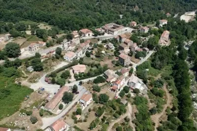 an aerial view of a house in a village at Casa Bartoli, T2 Entre Mer et Montagne in Isolaccio-di-Fiumorbo