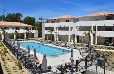 a view of the pool at the resort at marina di bravone 185 vue mer in Linguizzetta