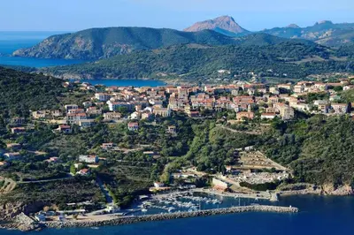 an aerial view of a small town on a mountain at Appartement Tour d'Omigna Cargèse in Cargèse