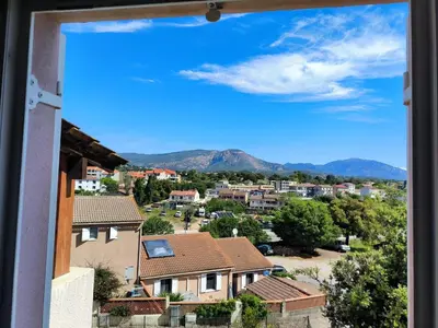 a view from a window of a residential neighborhood at Maison chaleureuse à Ajaccio avec vue sur le jardin in Ajaccio