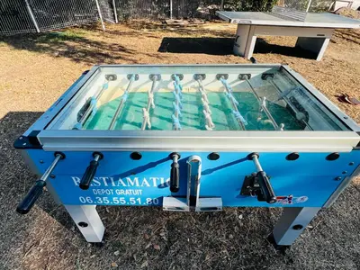 a pool table with a glass top on top at T2 Neuf à 800 m de la plage de Cala Rossa appart n 80 in Lecci