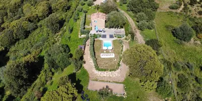 an aerial view of an estate with a pool at La Bergerie de l'Alivettu en Corse in Alata