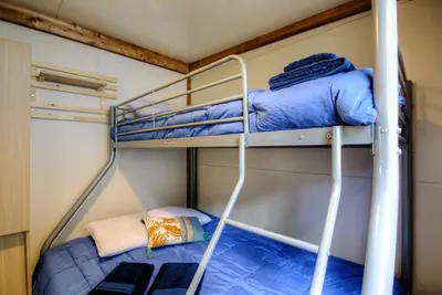 a couple of bunk beds in a room at CHALET U Castagnu in Venaco
