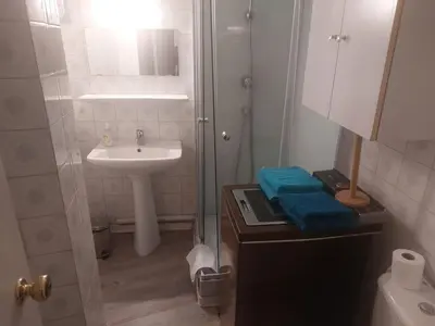 a small bathroom with a sink and a shower at AJACCIO Beau Studio pour 3 a 4 pers en Plein Centre de la Vieille Ville Historique in Ajaccio