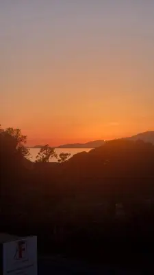 a sunset with a view of a body of water at Magnifique! Idéal! in Grosseto-Prugna