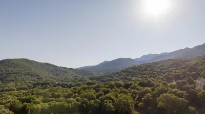 an aerial view of a valley with mountains at Casa Emma in Sollacaro