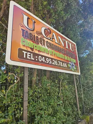 a sign for a cantin chiropractic clinic at Ferme Auberge U Cantu d'Adelio in Olivese